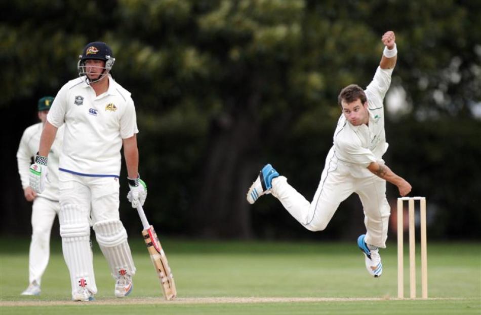 Central Districts paceman Doug Bracewell bowls during Otago's second innings  on the third day of...