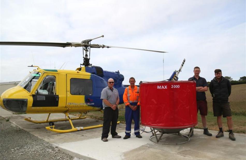Central South Island Helicopters director and pilot John Oakes (left) stands with pilot Paul...
