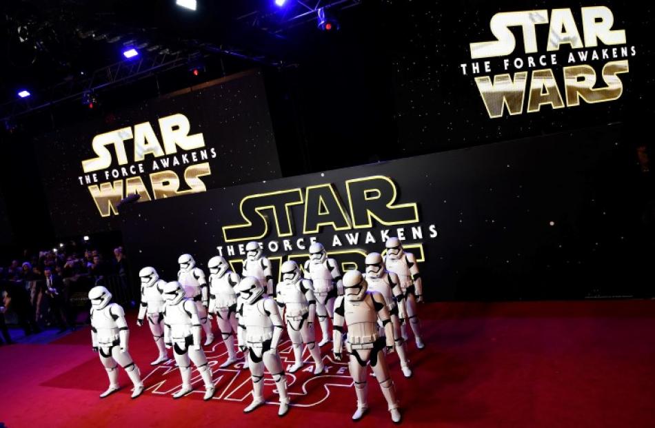 Characters in costume pose at the European Premiere of Star Wars, The Force Awakens in Leicester...