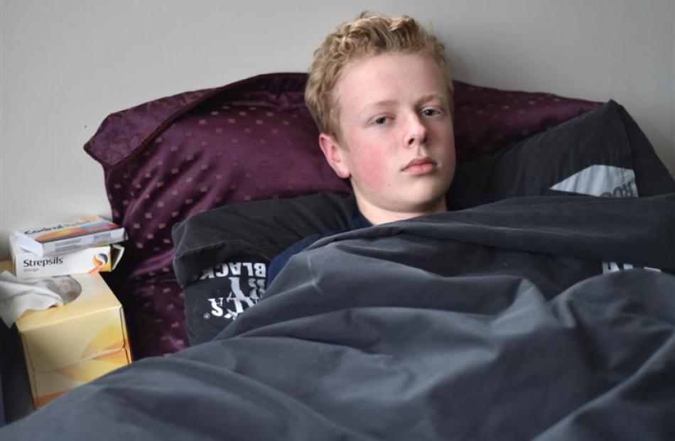 Charles Small (14), has been sick for a week. Photo by Gregor Richardson.