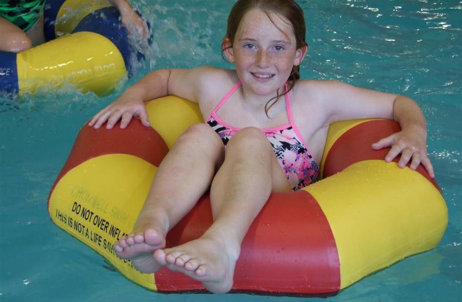 Charlize Thomson (11), of Cromwell, tests some of the gear at the party. Photos by Lynda van Kempen.