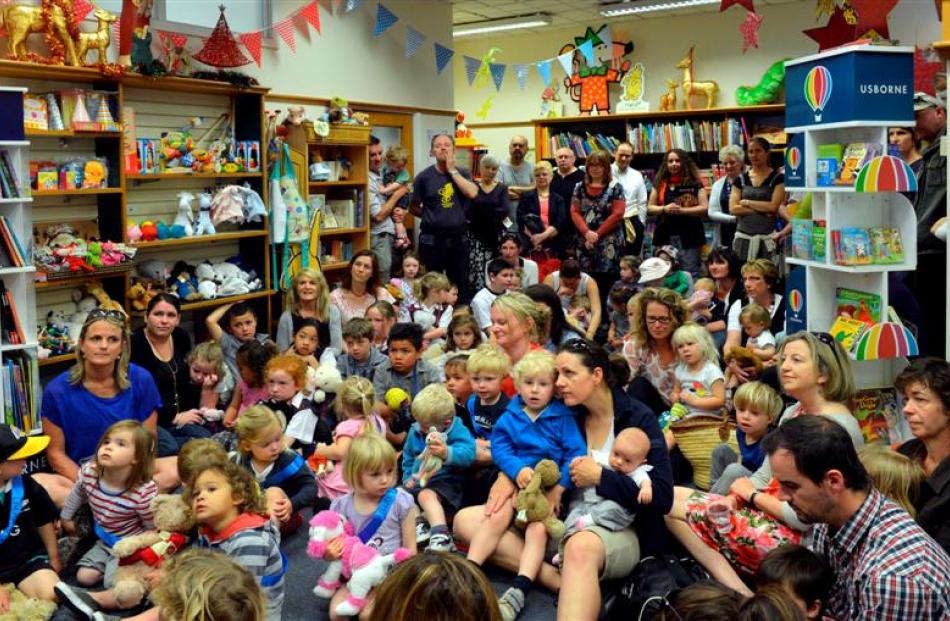 Children, adults and teddy bears filled the Children's Room at the University Book Shop in...