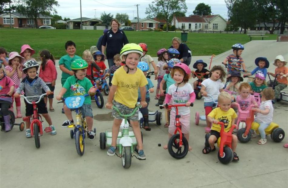 Children, parents, and staff of the Tokomairiro Early Learning Centre celebrate plans for a cycle...