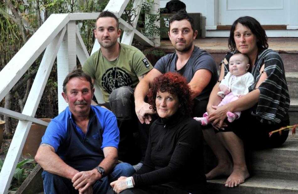 Chris and Jenny Ryalls (foreground) and their children, Kade (left), Tristin and Milair Ryalls ...