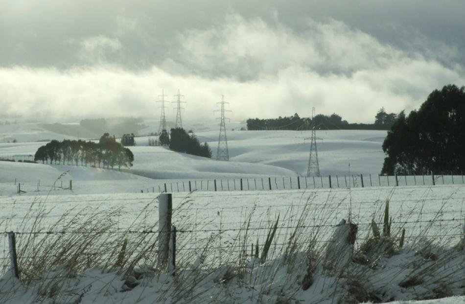 Clearing . . . South Otago saw snow, hail, sleet, rain and sunshine all before noon Friday.