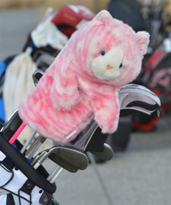 Clubs at the New Zealand Open protected by a glove puppet. Photo by Peter McIntosh.