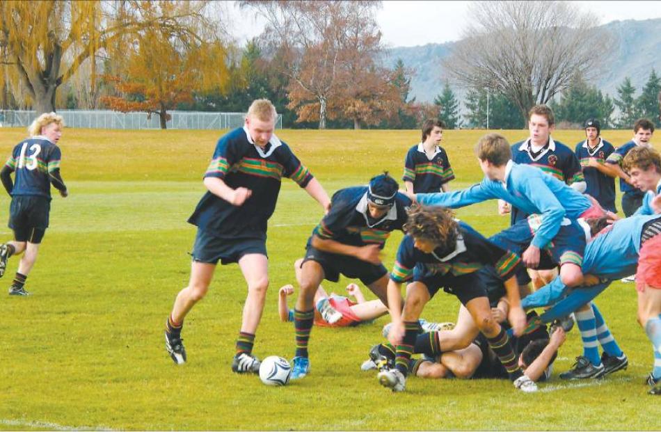 Top trio: On attack for Central (in dark colours) under-16 are front (from left) Alex Wright,...