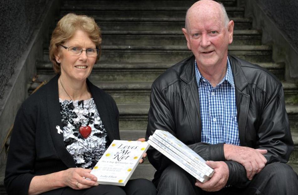 Co-authors Lesley Elliott and Bill O'Brien in Dunedin  with their book Loves Me Not: How to Keep...