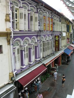 Colourful buildings in Chinatown house an equally colourful collection of shops.  Photo by Jeff...