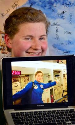Columba College pupil Ailsa Carroll with a photo of herself, taken in the International Space...