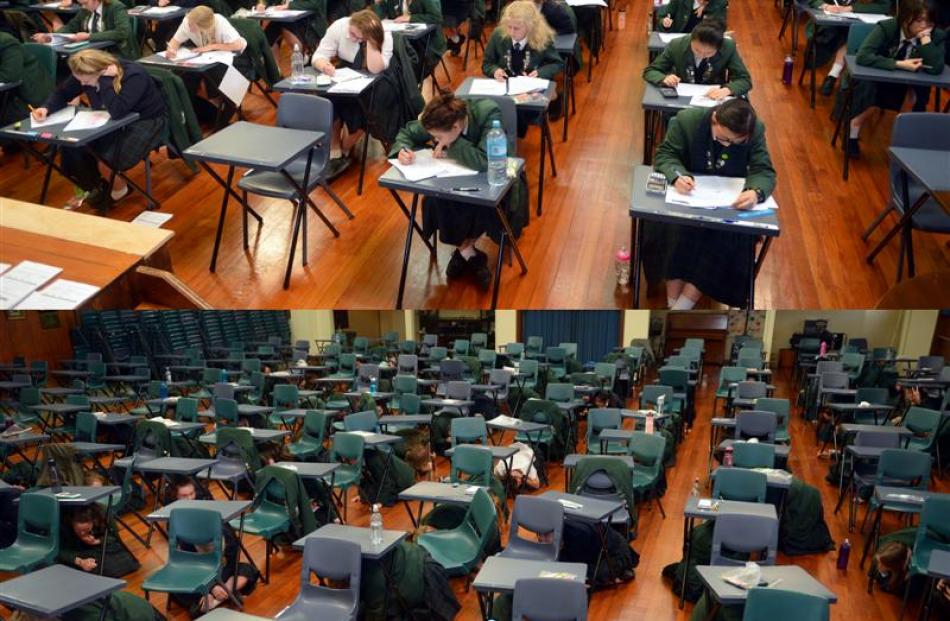 Columba College pupils run an earthquake drill after a three-hour school exam yesterday. Photo by...