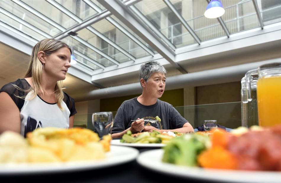 Compass national development and innovation manager Lauren Scott (left) samples the meals with...