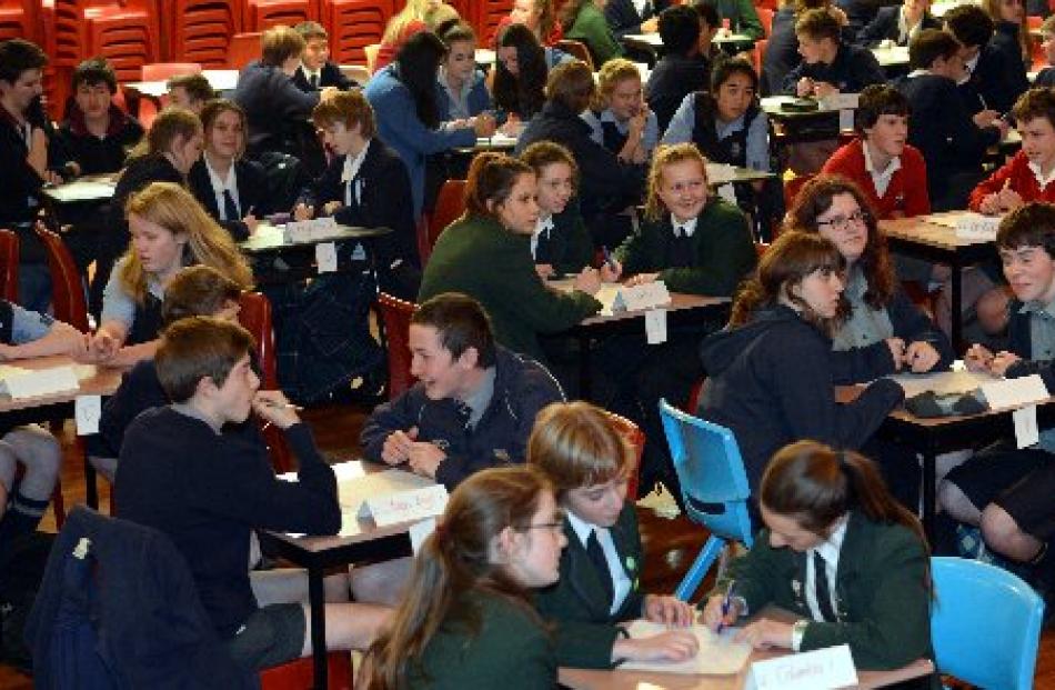 Contestants in the year 9 and 10  Otago Daily Times Extra! spelling quiz ponder a question at...