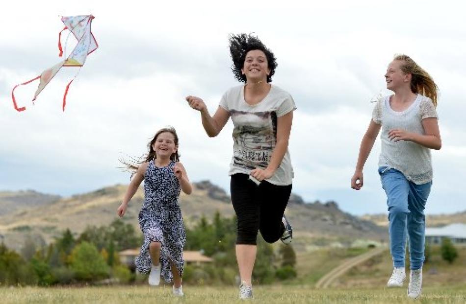 Cousins (from left) Aleece (7), Cayla (13) and Jemelia (12) Hosking, all of Dunedin, learn to fly...