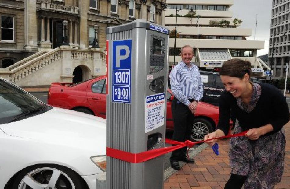 Cr Jinty McTavish cuts the ribbon on the council's new solar-powered ticketless parking meter,...