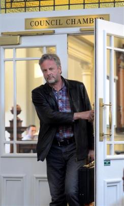 Cr Lee Vandervis leaves yesterday's Dunedin City Council meeting after being asked to make a '...
