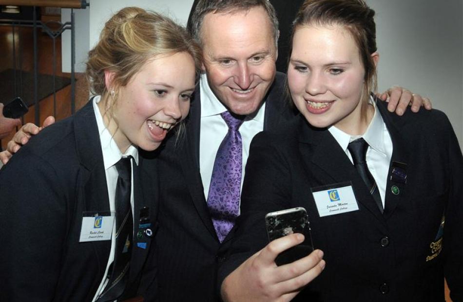 Cromwell College pupils Rachel Clark (left) and Jacinda Morton (right) have their photo taken...