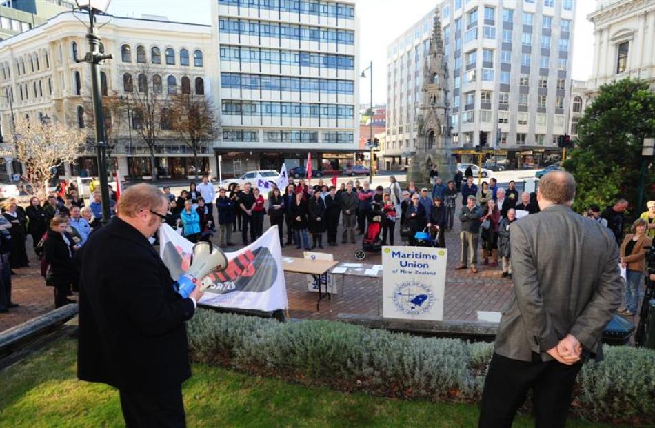 Customers of the metro Post Shop and Kiwibank gather to protest its closure in Dunedin's Exchange...