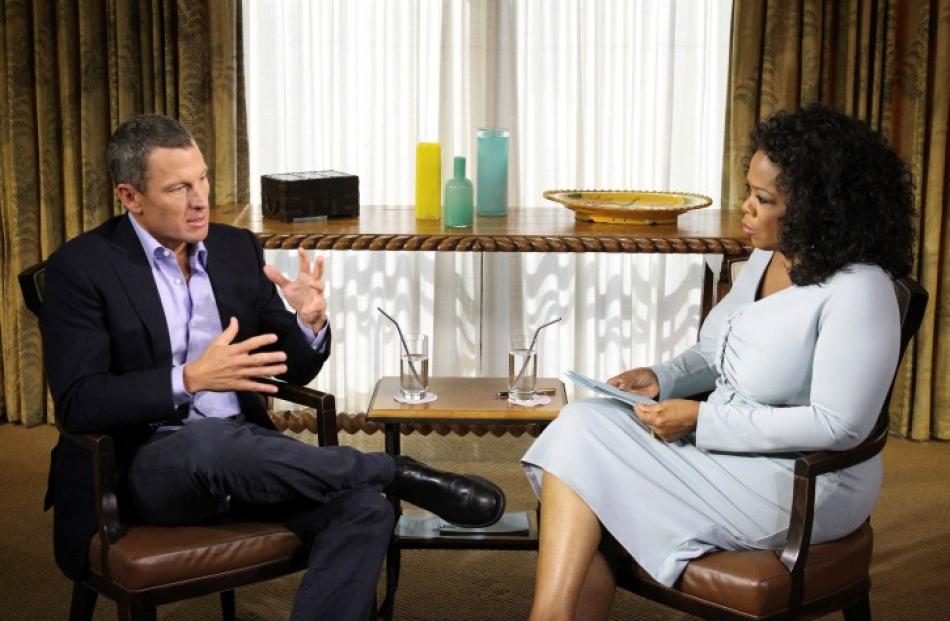 Cyclist Lance Armstrong is interviewed by Oprah Winfrey in Austin, Texas in theis handout photo...