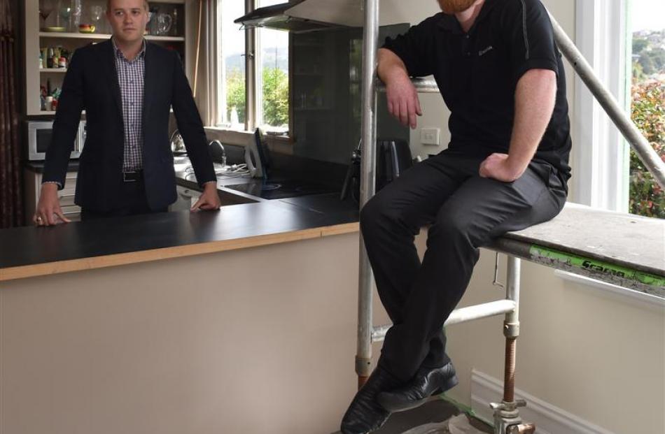 Damon Johnson (left) and Stuart Henderson at their Maori Hill home, one of three in close...