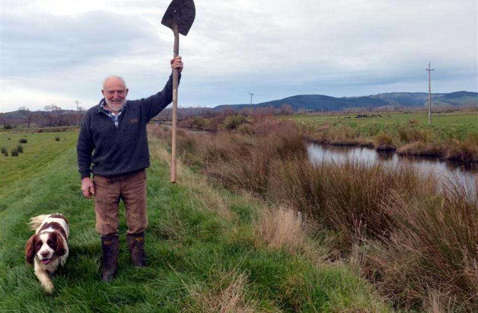 Dan Lyders, with Gillie, celebrates a settlement in his case against the Otago Regional Council...