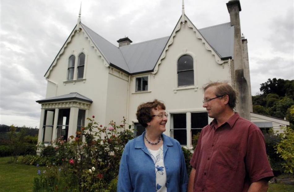Daphne and Bill Lee stand outside their Leithendel home, situated on the hill above Malvern St in...
