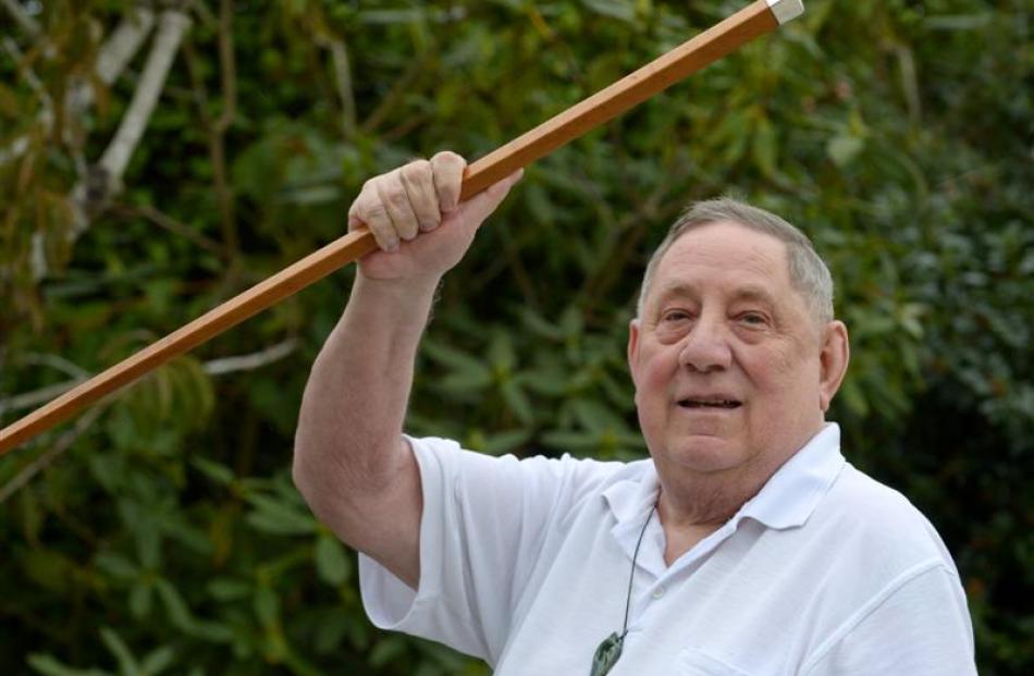 David Ellison holds a walking cane which was given to his grandfather John Matapura Ellison in...