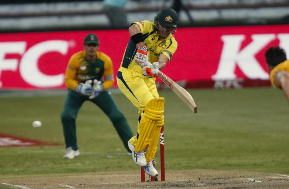 David Warner plays a shot down the leg side for Australia against South Africa. Photo: Reuters