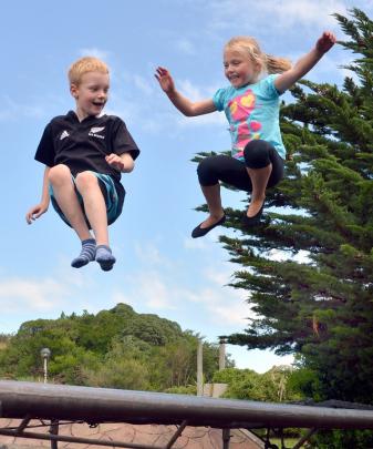 Deakin (7) and Jordin (5) Eckhoff enjoy a bounce on the Dunedin Hoiliday park trampoline...