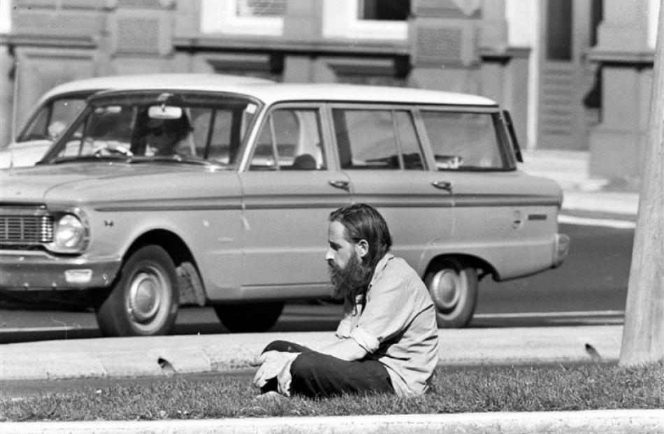 Deep in contemplation,  Baxter sits  on a traffic island near Queens Gardens  in 1970. Baxter was...