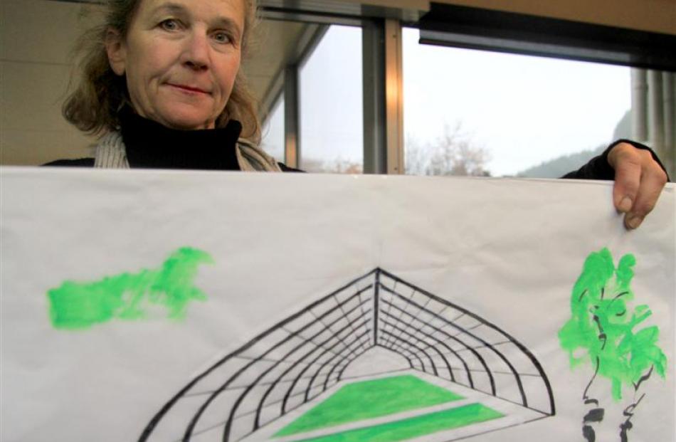 Designer Marjorie Hay, of Lawrence, brought friend Zuna Wright's concept drawing of a possible...