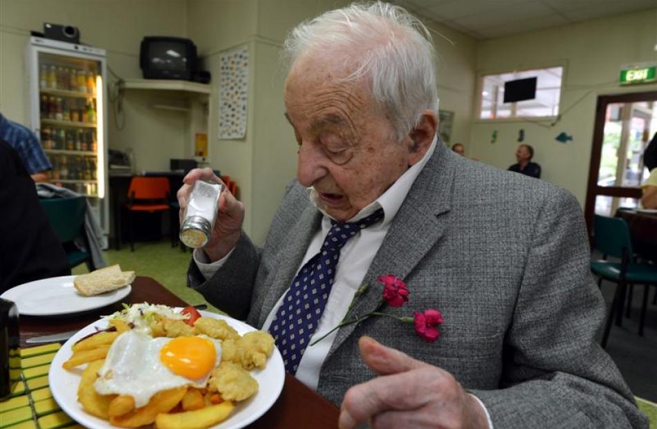 Dick Reid celebrates his 100th birthday by tucking into a meal which included six oysters, at the...