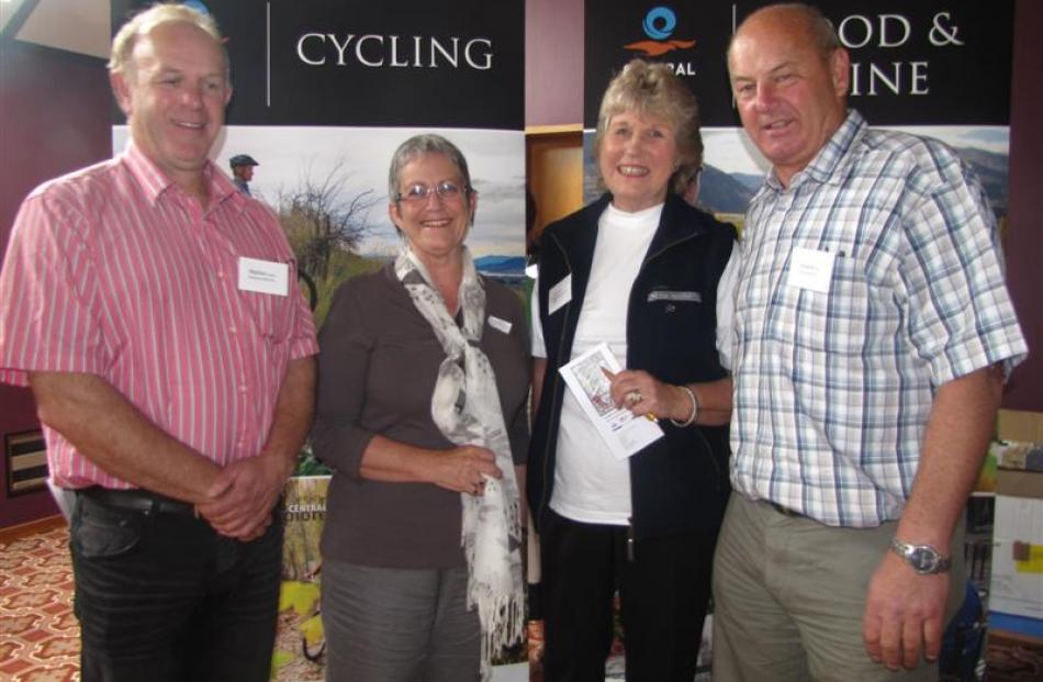 Discussing cycling tourism  are (from left) Roxburgh Gorge Trail Trust chairman Stephen Jeffery,...