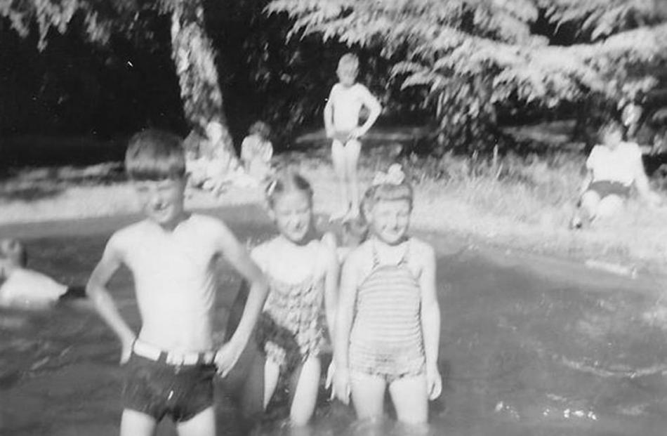 Don Sinclair at a Queenstown pool with his sister and a friend, captured on his mother’s Box...