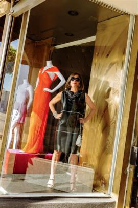 Doris Raymond in the front window of The Way We Wore.