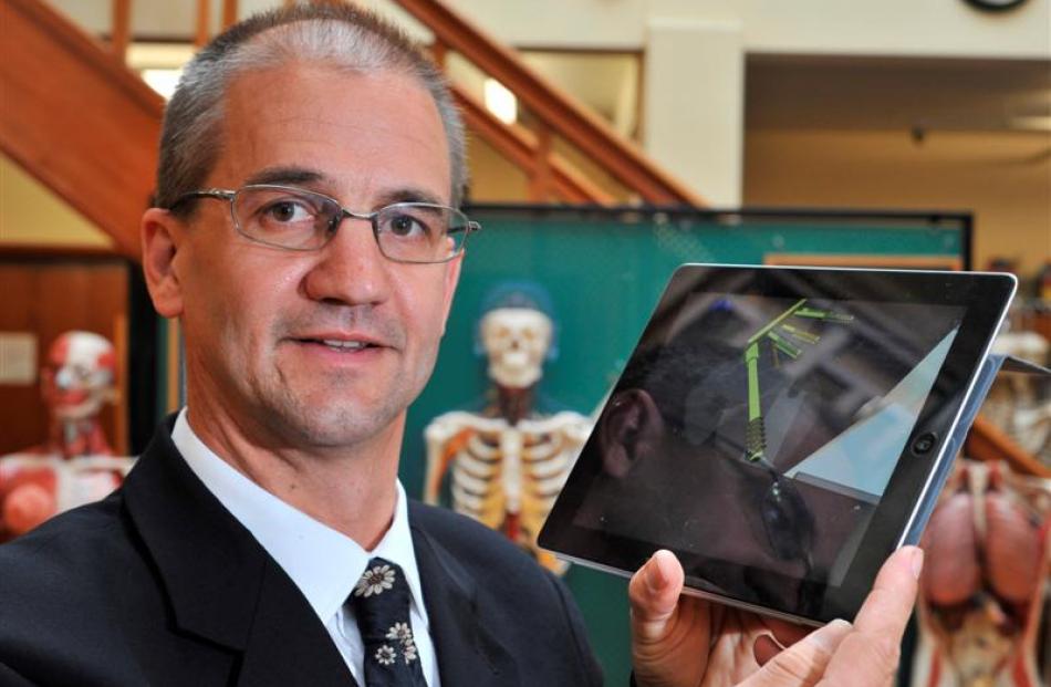 Dr Phil Blyth with his surgery app at the University of Otago School of Medicine Anatomy Museum...