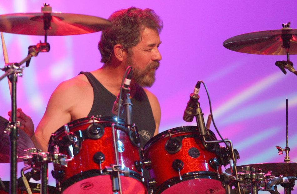 Drummer Doug "Cosmo" Clifford (pictured) and fellow original Creedence Clearwater Revival member,...