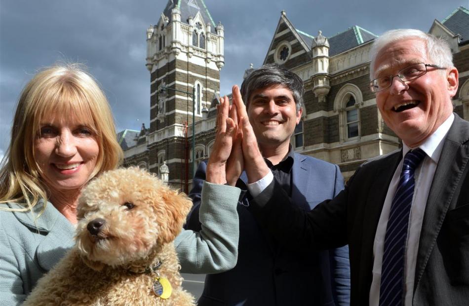 Dunedin barrister and courthouse advocate Anne Stevens (left) and her dog Louie celebrate...