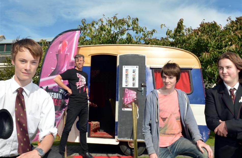 Dunedin Fringe Festival director Paul Smith (rear) and the Reels on Wheels caravan at the Dunedin...