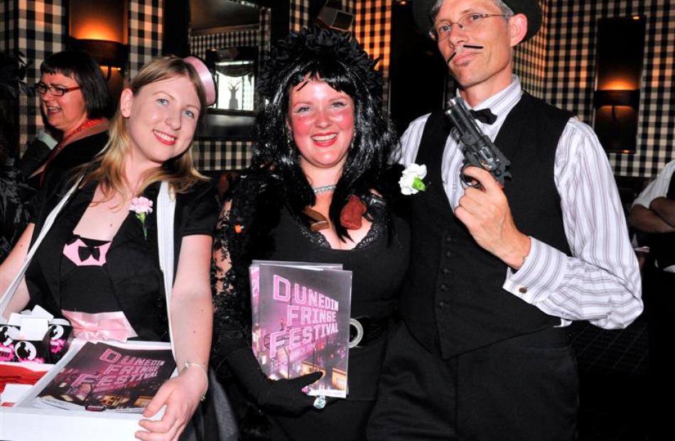 Dunedin Fringe Festival event assistant Lena Plaksina (left), festival club MC Tahu Mackenzie and...