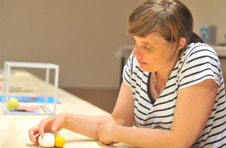 Dunedin Public Art Gallery's visiting artist Erica van Zon sets up Peeled Egg, part of her...