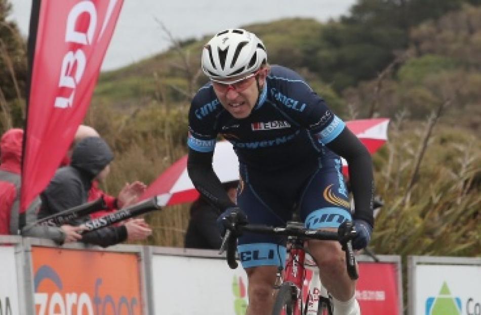 Dunedin's Brad Evans climbs his way up Bluff Hill to a stage victory and the overall lead in the...