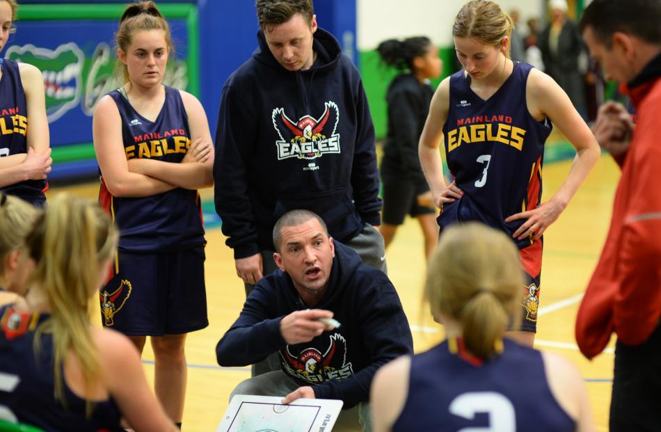 Eagles coach Mark Dickel addresses his Mainland Eagles players at the Green Valley Christmas...