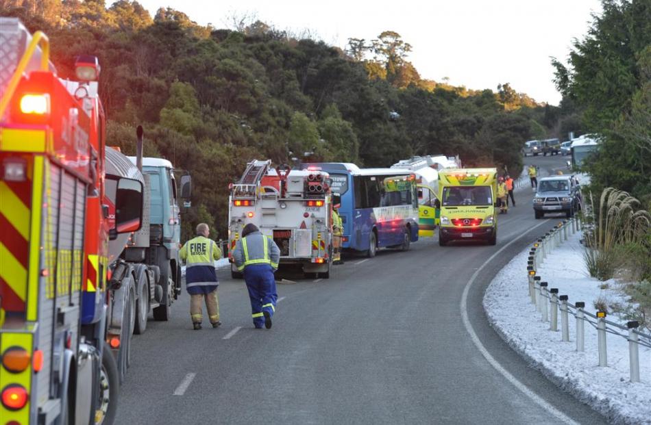 Emergency services at the scene of the Northern Motorway crash. Photo by Stephen Jaquiery