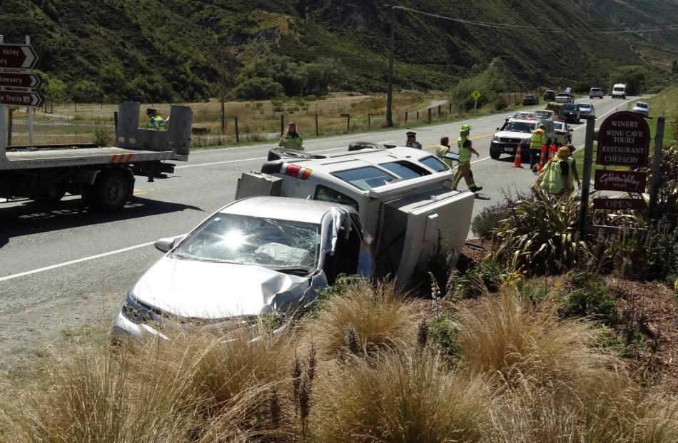 Emergency services attach a crash at Gibbston, near Queenstown, this morning. Photo by Paul Taylor