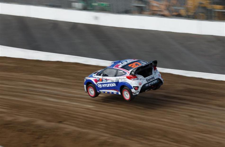 Emma Gilmour gets airborne in her Rhys Millen Racing Hyundai Veloster Turbo at the Los Angeles...