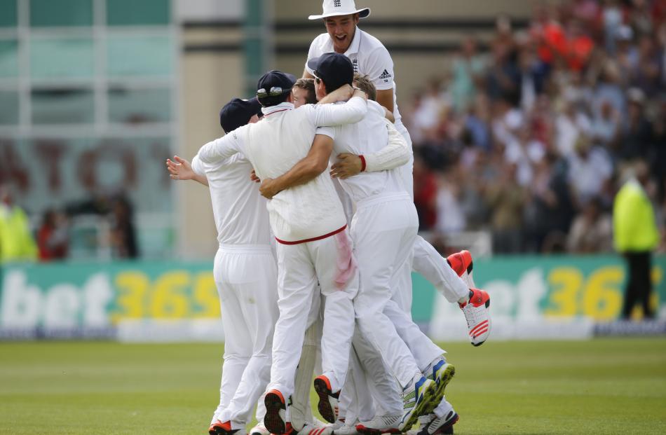 England players celebrate after winning the fourth test of the 2015 Ashes and clinching the...