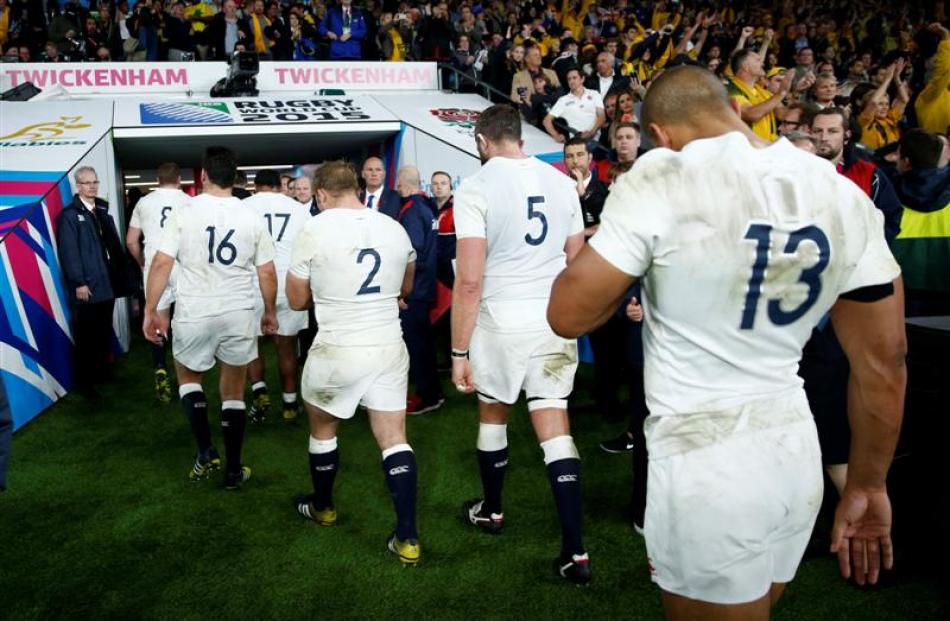 England players leave the field after losing to Australia at Twickenham at the weekend. Photo:...