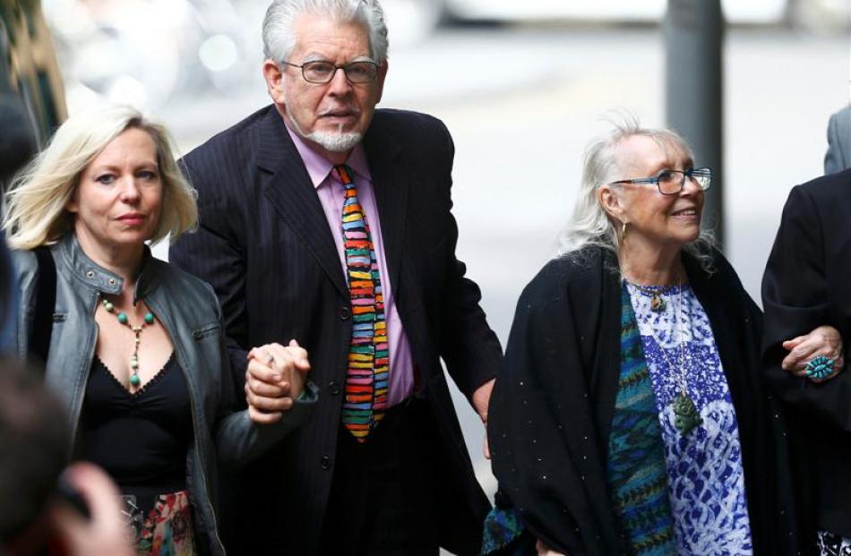 Entertainer Rolf Harris arrives with his daughter Bindi and wife Alwen Hughes at Southwark Crown...