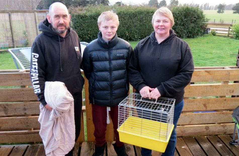 Equipped with their albatross catching kit - a sheet and cat cage - are Todd Hessey, Dion Muir ...